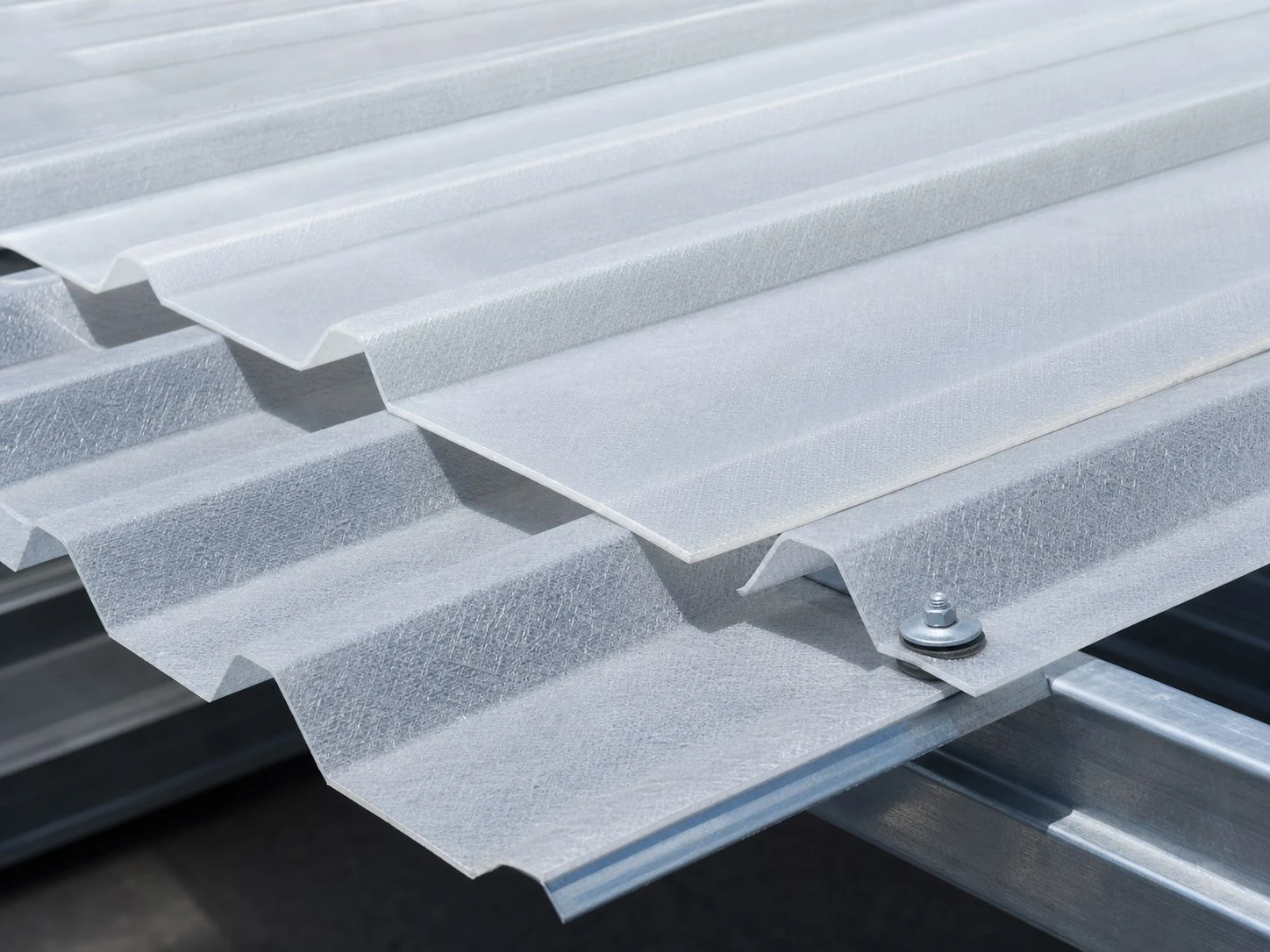 Close-up of opaque and translucent corrugated fiberglass roof panels